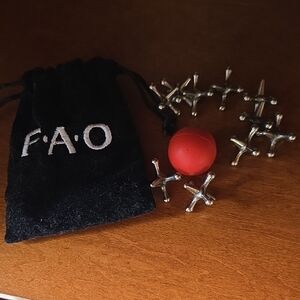 FAO Silver and Red Jacks Game Set